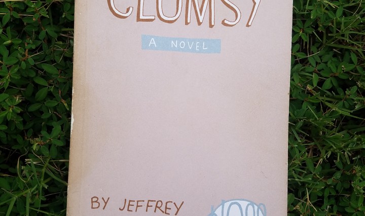 Book Cover, Graphic novel by Jeffrey Brown, book in grass